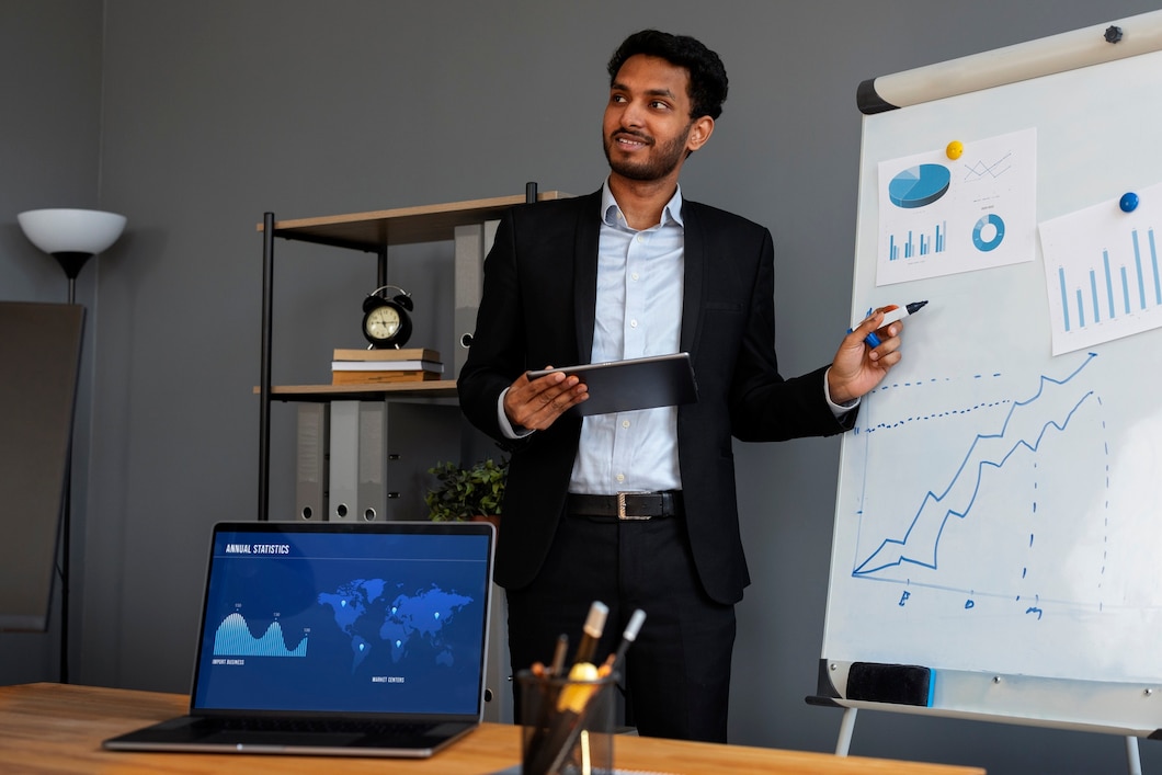 business-person-looking-finance-graphs_23-2150461332