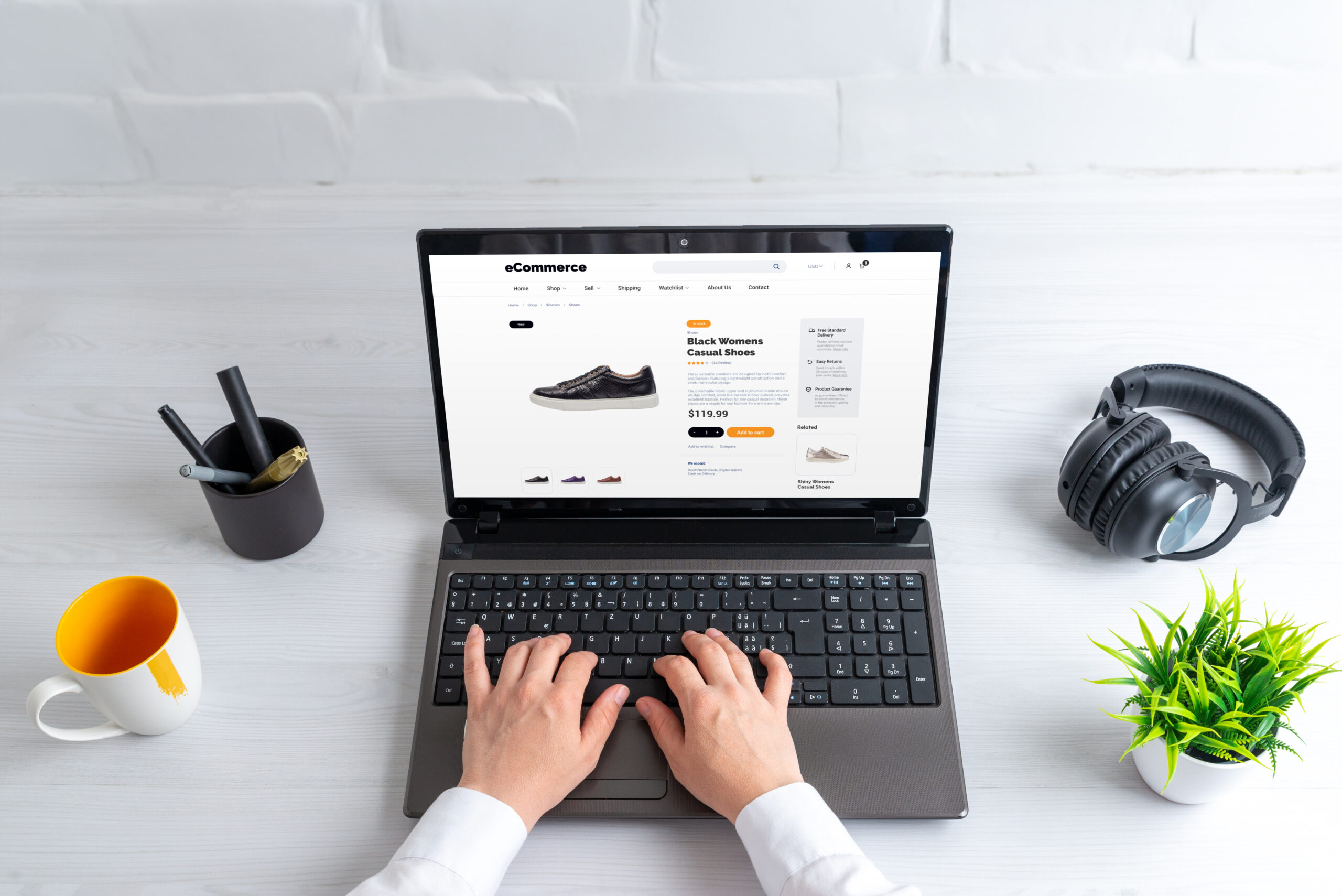 Woman purchases black women's casual shoes online from ecommerce website. Enjoy free shipping option for convenient and stylish footwear shopping